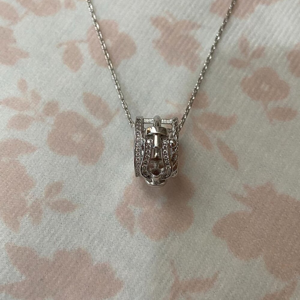 Fred David U-Shaped Horseshoe Necklace With Diamond Center.